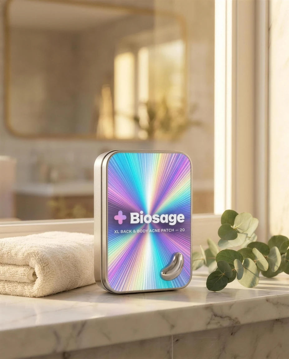 Biosage tin on a marble bathroom counter in golden hour light