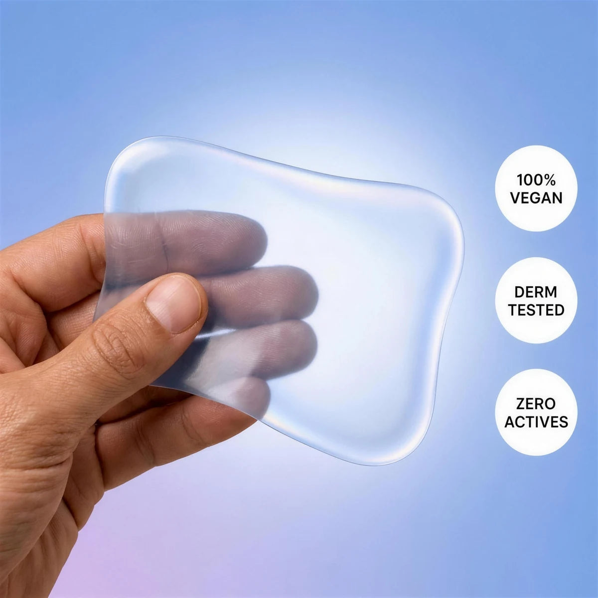 Hand holding one XL patch — 100% vegan, derm tested, zero actives