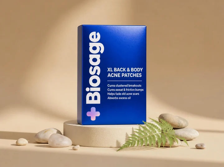 Biosage box standing on a cream podium surrounded by stones, a fern and patches